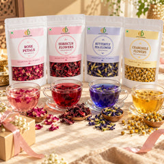 Festive herbal drinks gift set with rose, hibiscus, butterfly pea and chamomile flower pouches and brewed drinks